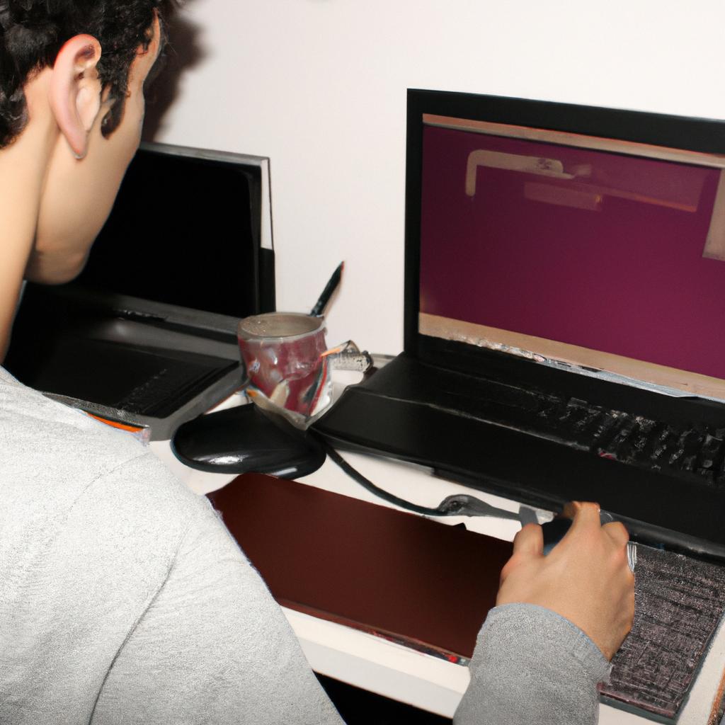 Person working on computer, designing